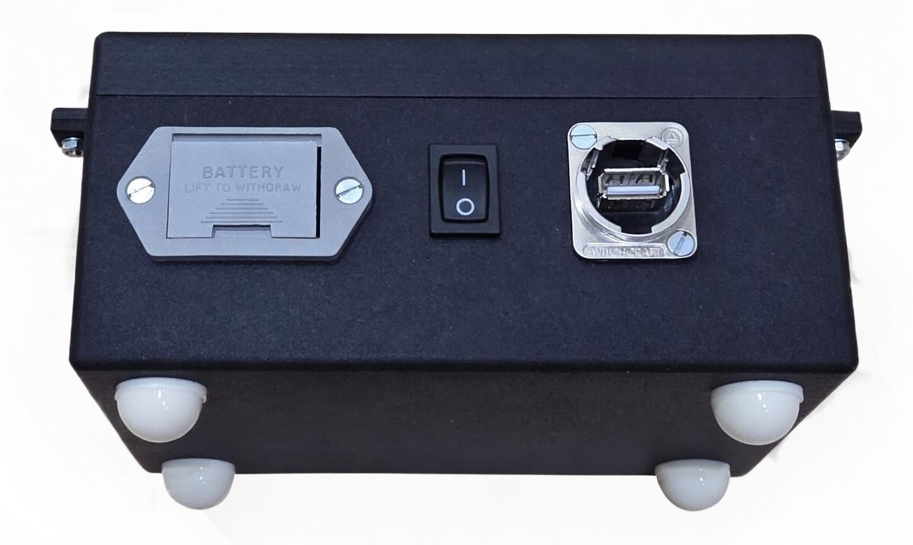 Rear view of SpeedGuide showing 9V battery compartment, On/Off switch and USB port